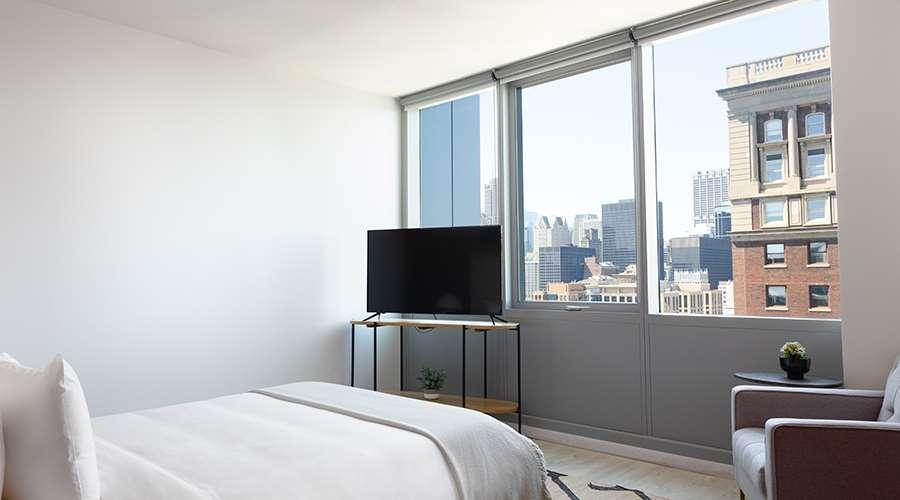 אפרטהוטל שיקגו Sentral Michigan Avenue חדר תמונה A bedroom at 100 East 14th Street
